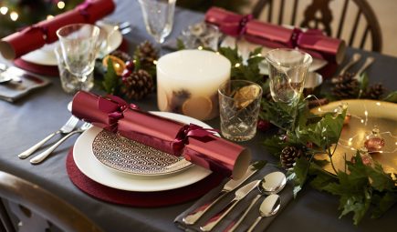 close-up-of-christmas-table-setting-with-christmas-royalty-free-image-1571173961